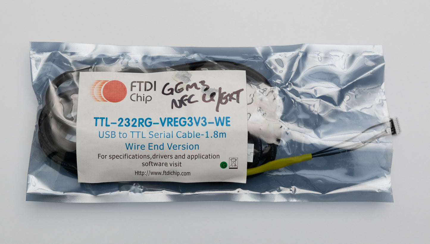 Image of a GEM3NFC LP/EXT FTDI cable in packaging from the front