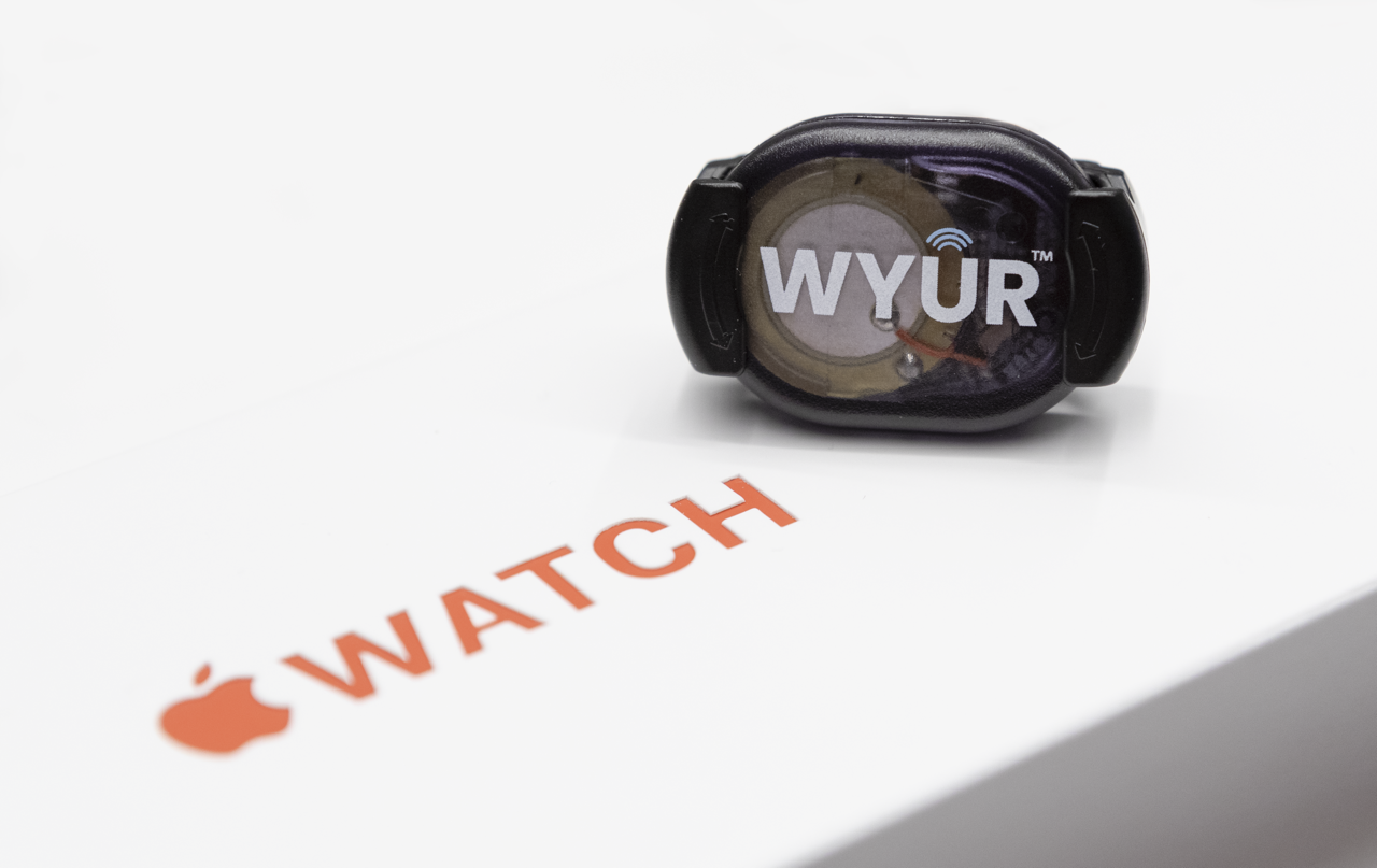 Image of a WYÛR sitting on an Apple Watch box